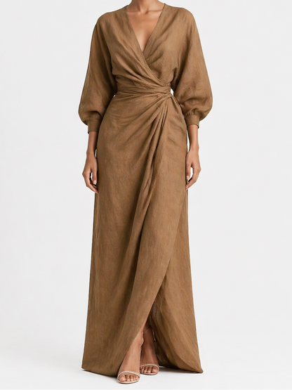 Woman wearing a brown dress on a white background