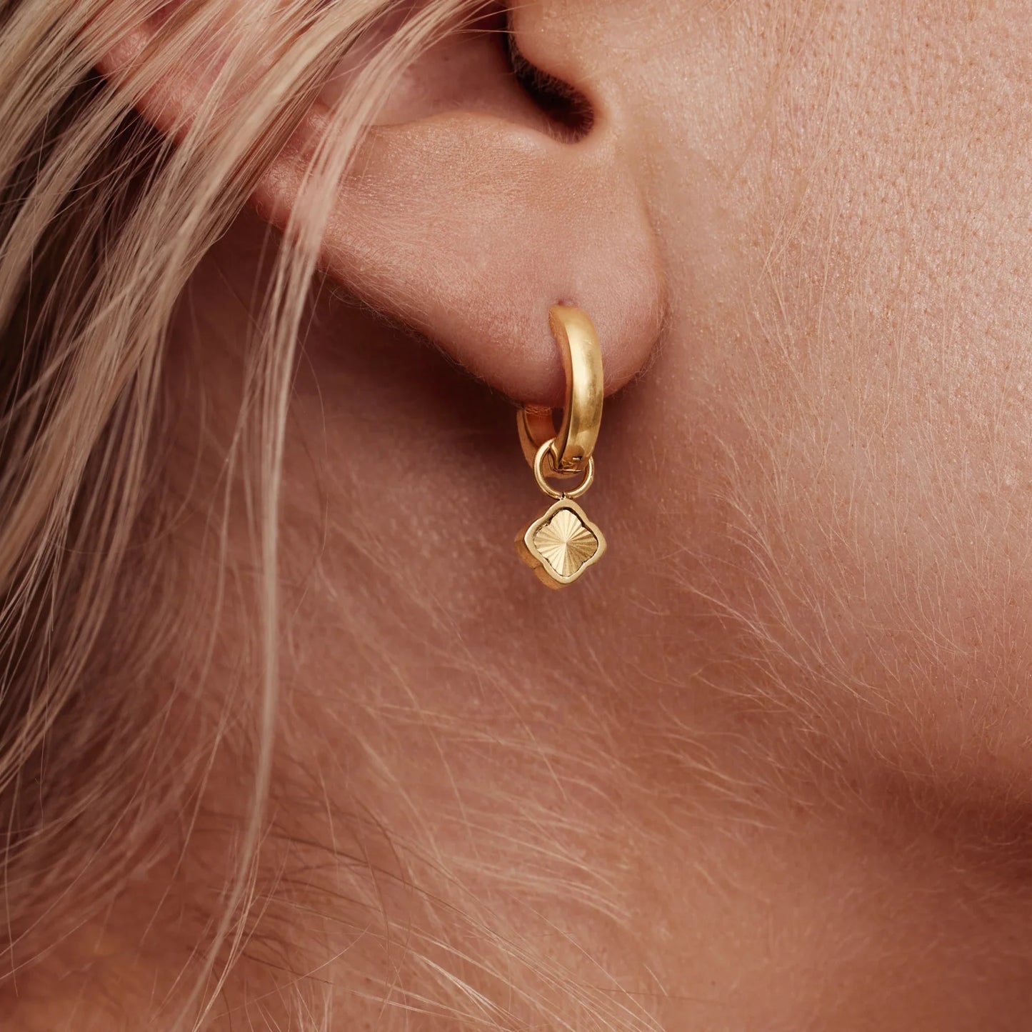 Mini Sunburst Clover Hoops | 18K Gold-Plated Stainless Steel | Huggie + Clover Charm