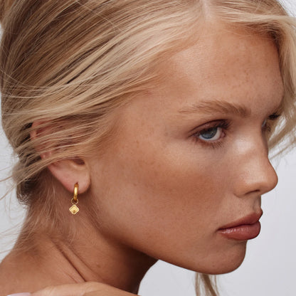 Mini Sunburst Clover Hoops | 18K Gold-Plated Stainless Steel | Huggie + Clover Charm